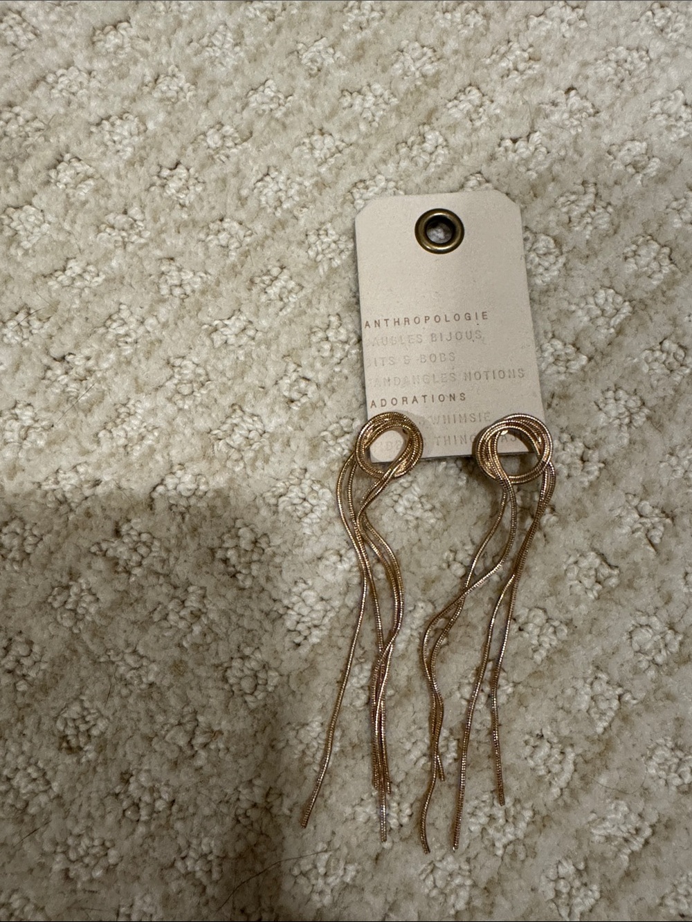 Anthropologie Twisted Knot Tassel Earrings in Rose Gold